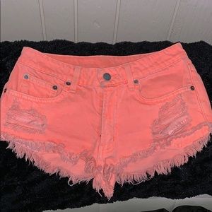 CARMAR neon orange denim shorts